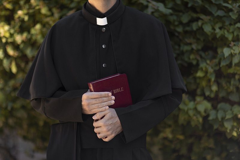 priest-reading-from-bible